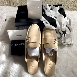 Chanel slides. New without tags. Comes with original box and dust bag.